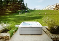 Jacuzzi® J385IP™ - 7 Person Hot Tub 27 Jacuzzi® J385IP™ - 7 Person Hot Tub -Blue Wave Supplies JHT J385 Lifestyle BrushedGray V3 2000x1414 cd4d6490 eb8a 4cc8 93ff 7e2768be9789